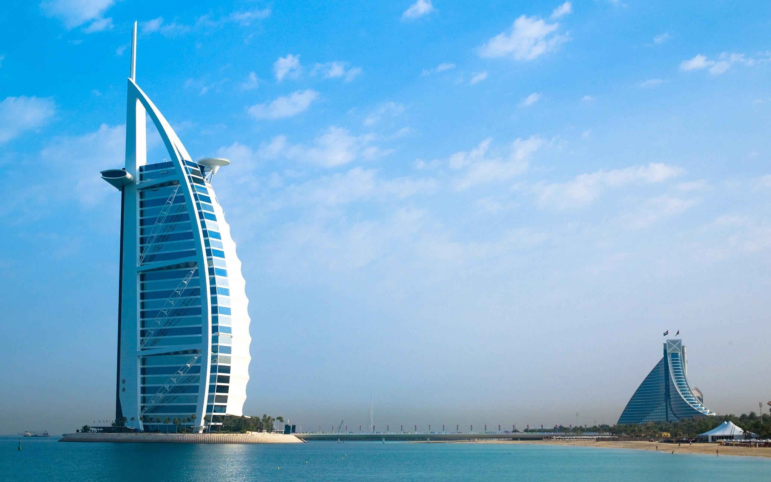 2560x1600 Wallpaper Dubai, skyscraper, river, blue sky 2560x1600 HD Picture, Image