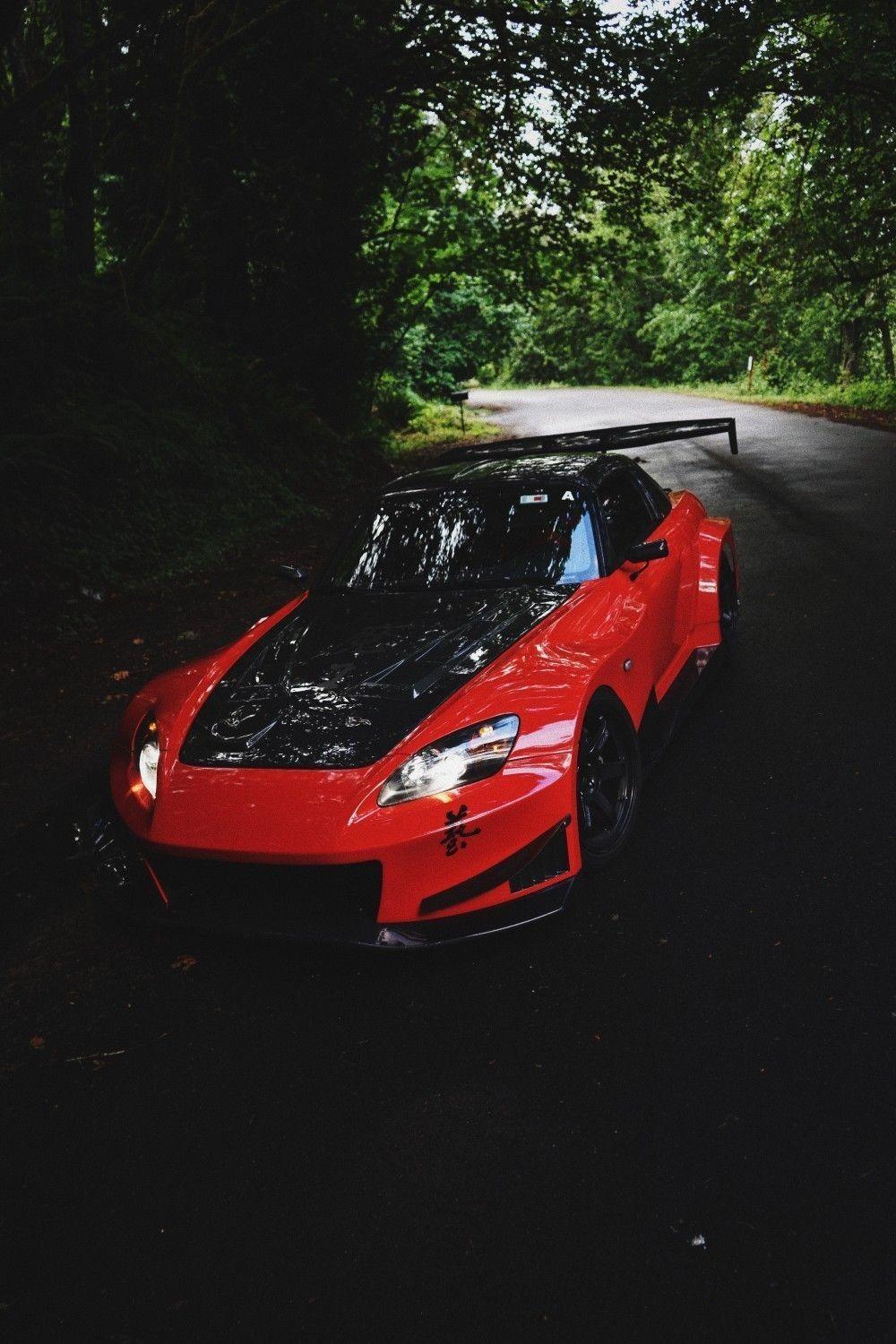 1000x1500 Red and Black Car Wallpaper