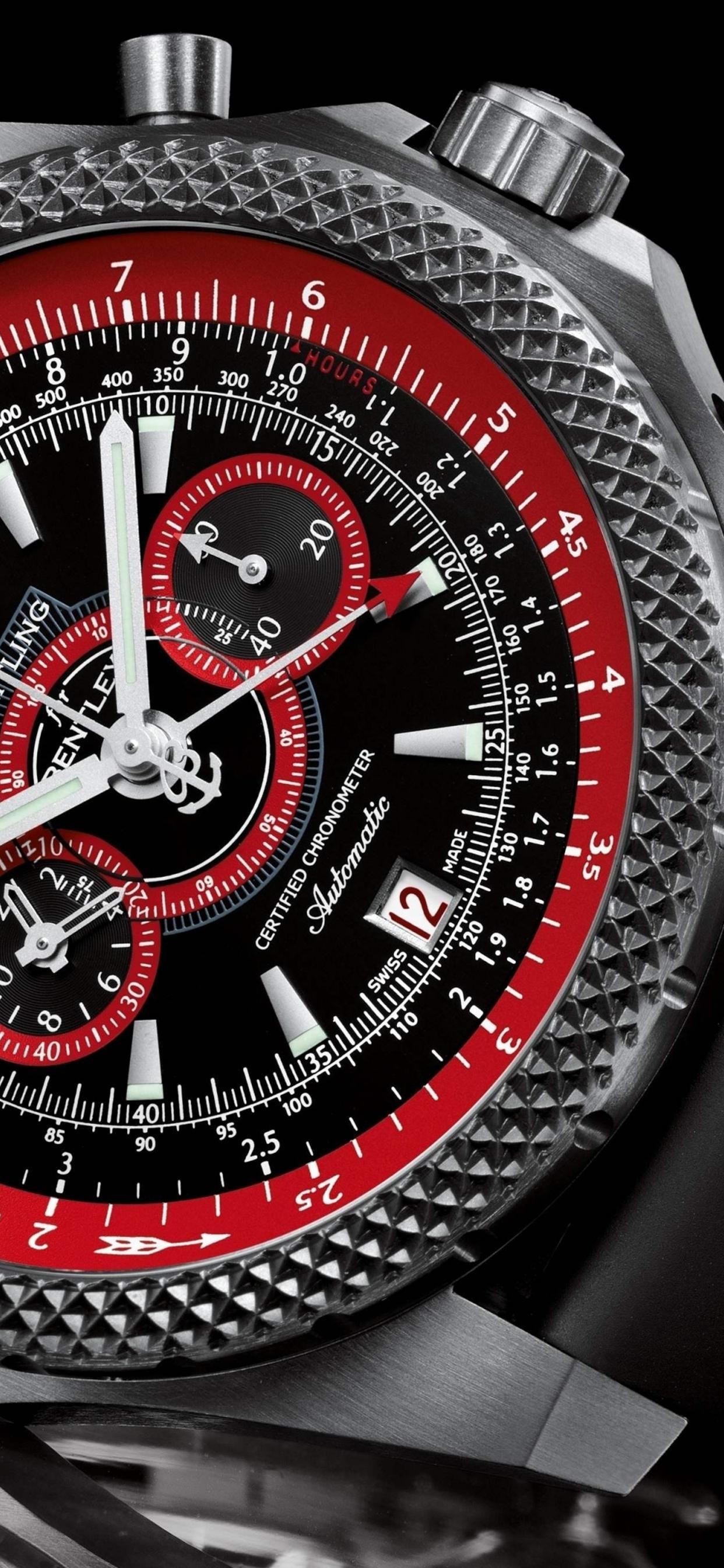 1242x2688 Red and black breitling watch