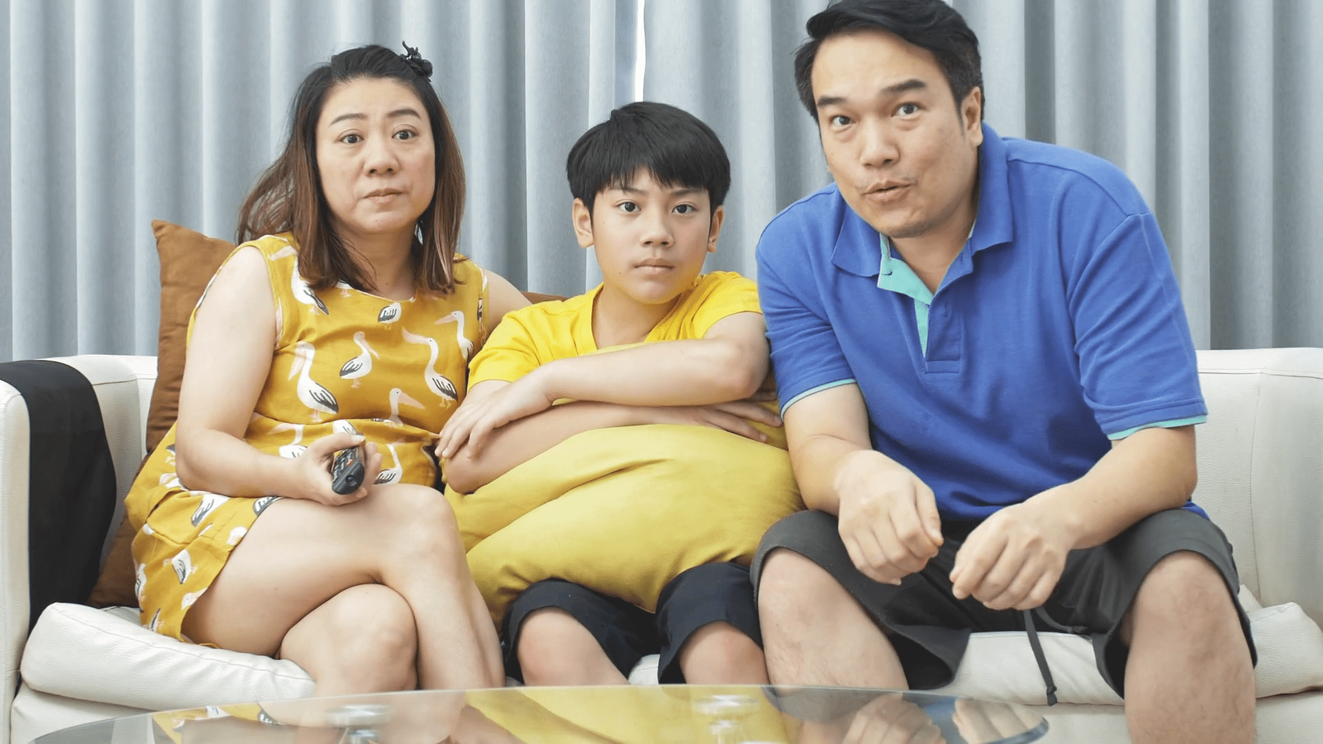 1920x1080 Slow motion of asian family father mother and son on couch, Looking at camera with smile face. Stock Video Footage
