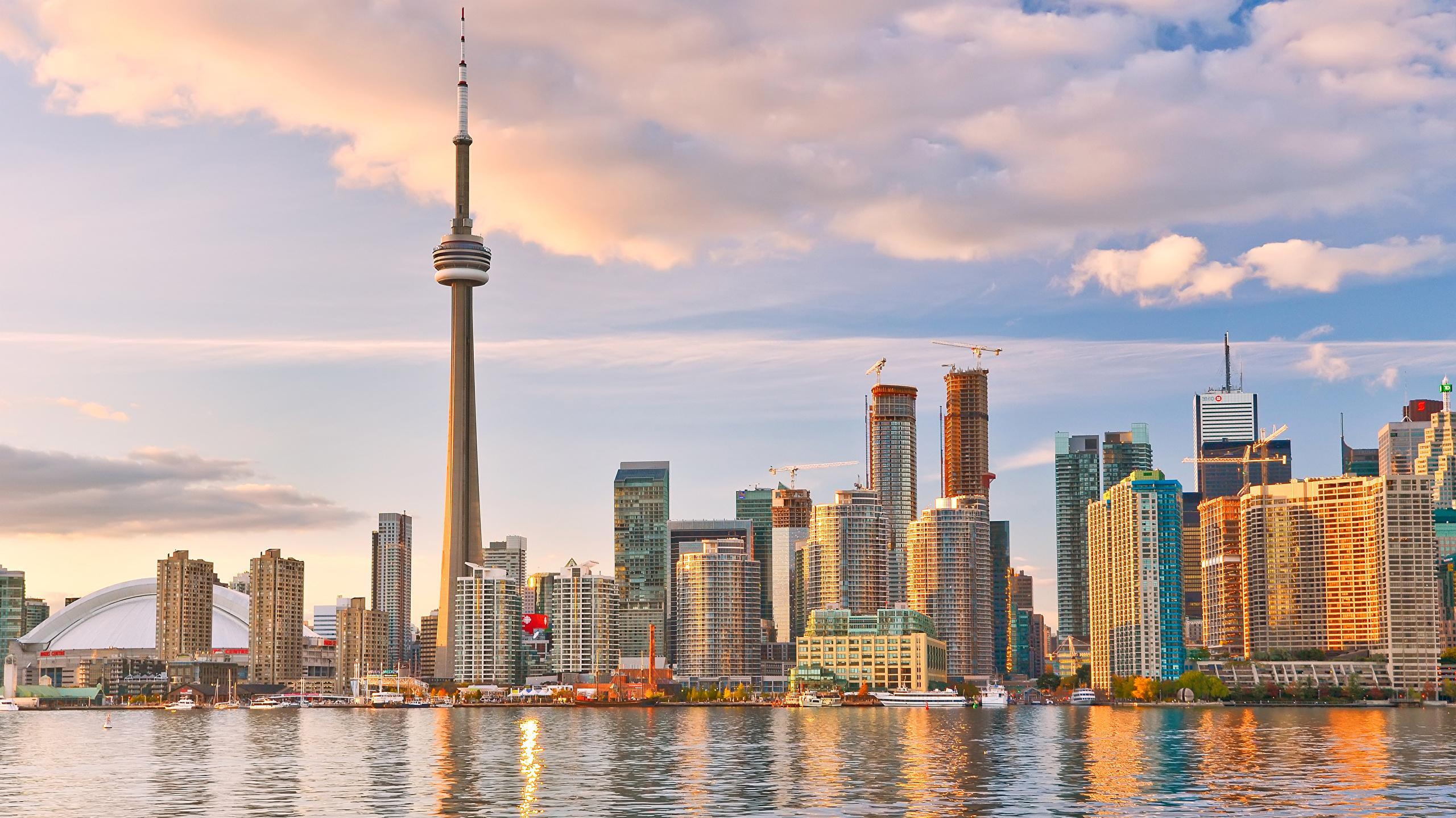 2560x1440 Picture Cities Canada Lake Skyscrapers Clouds Toronto 2560x1440
