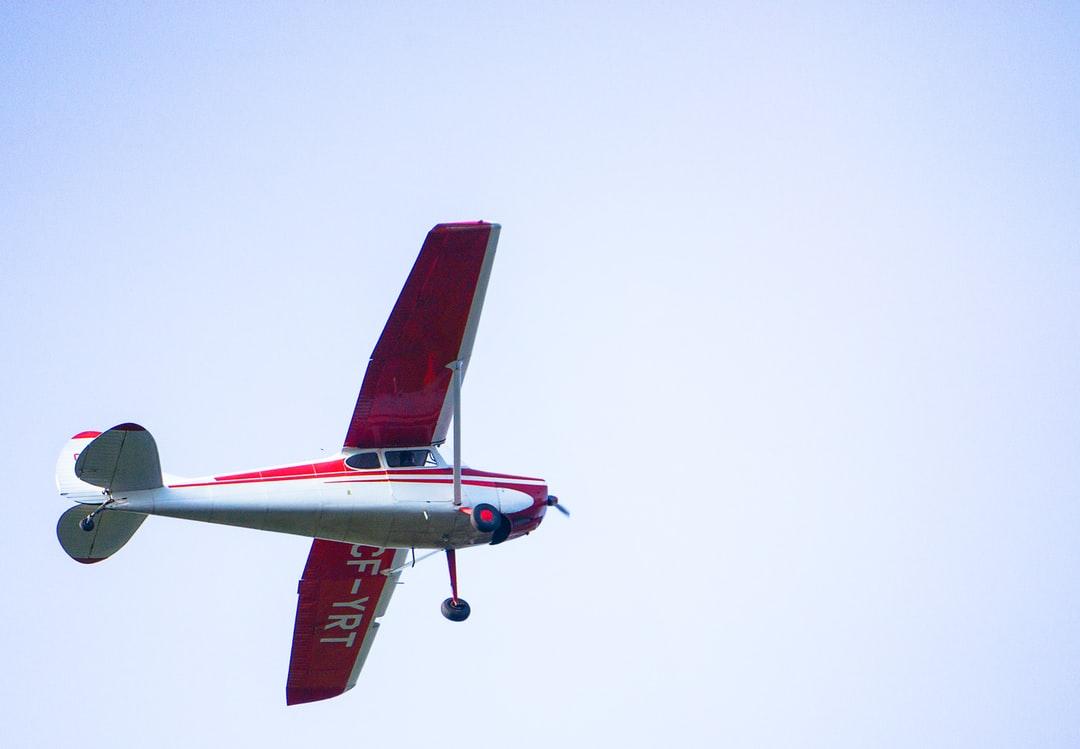 1080x749 red and white monoplane photo