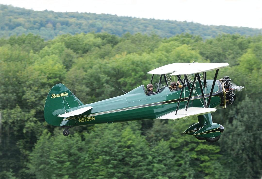 1080x738 green biplane photo