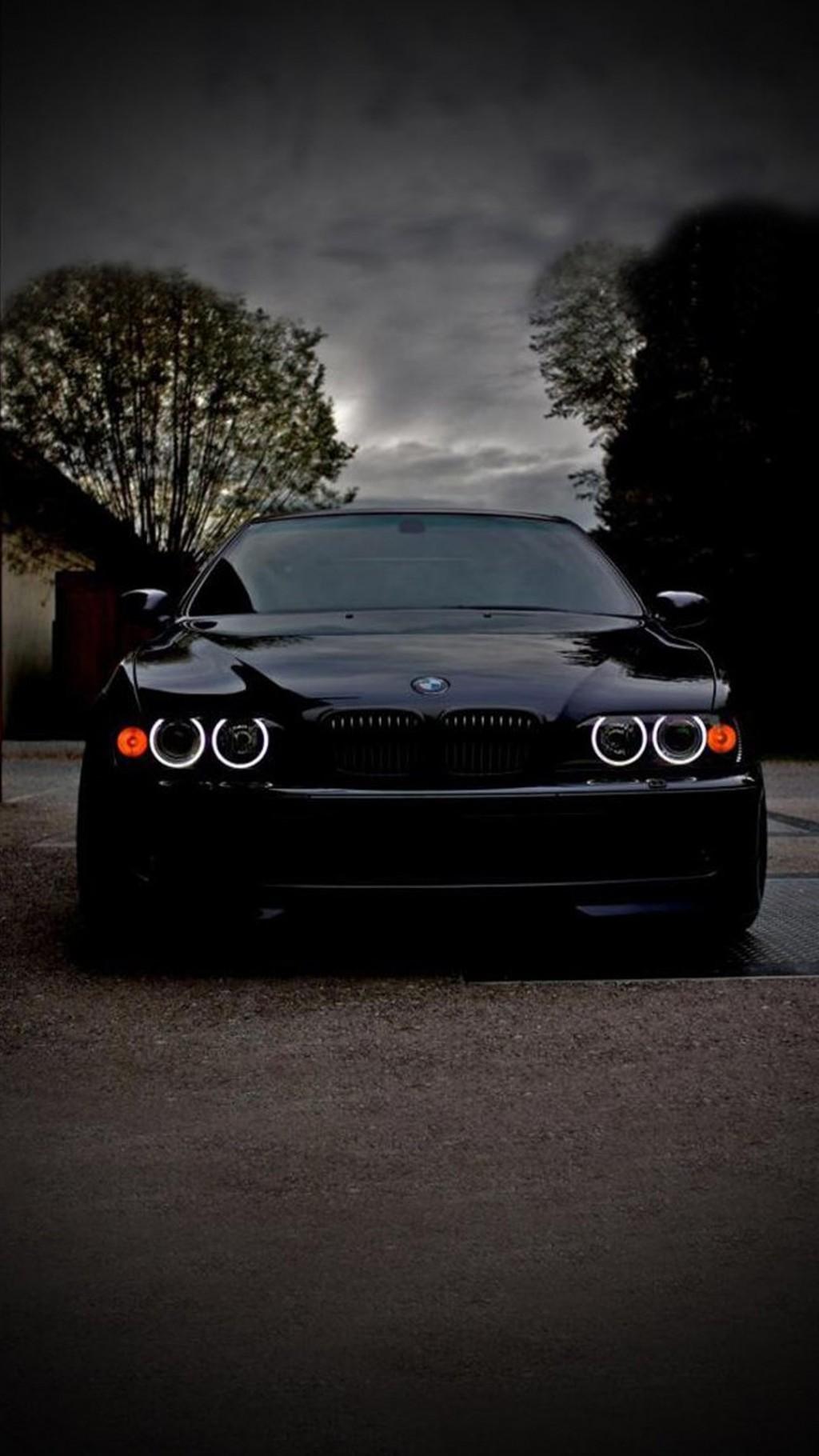 1024x1820 Black Car Wallpaper