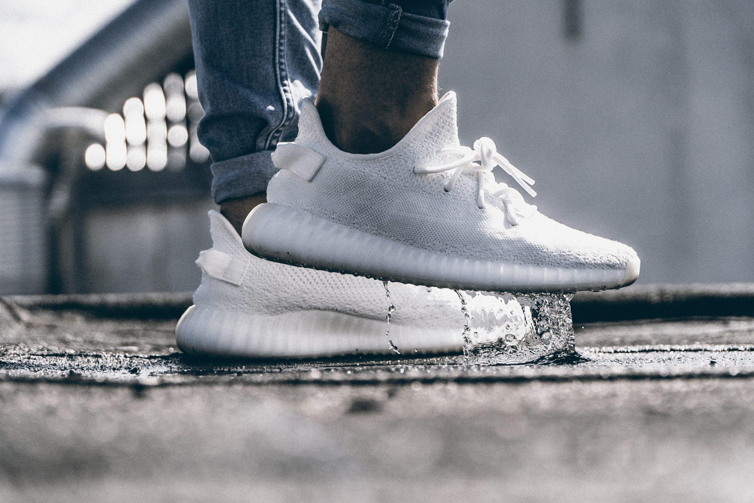 2560x1709 Person wearing pair of cream white Adidas Yeezy Boost 350 shoes wallpaper • Wallpaper For You HD Wallpaper For Desktop & Mobile