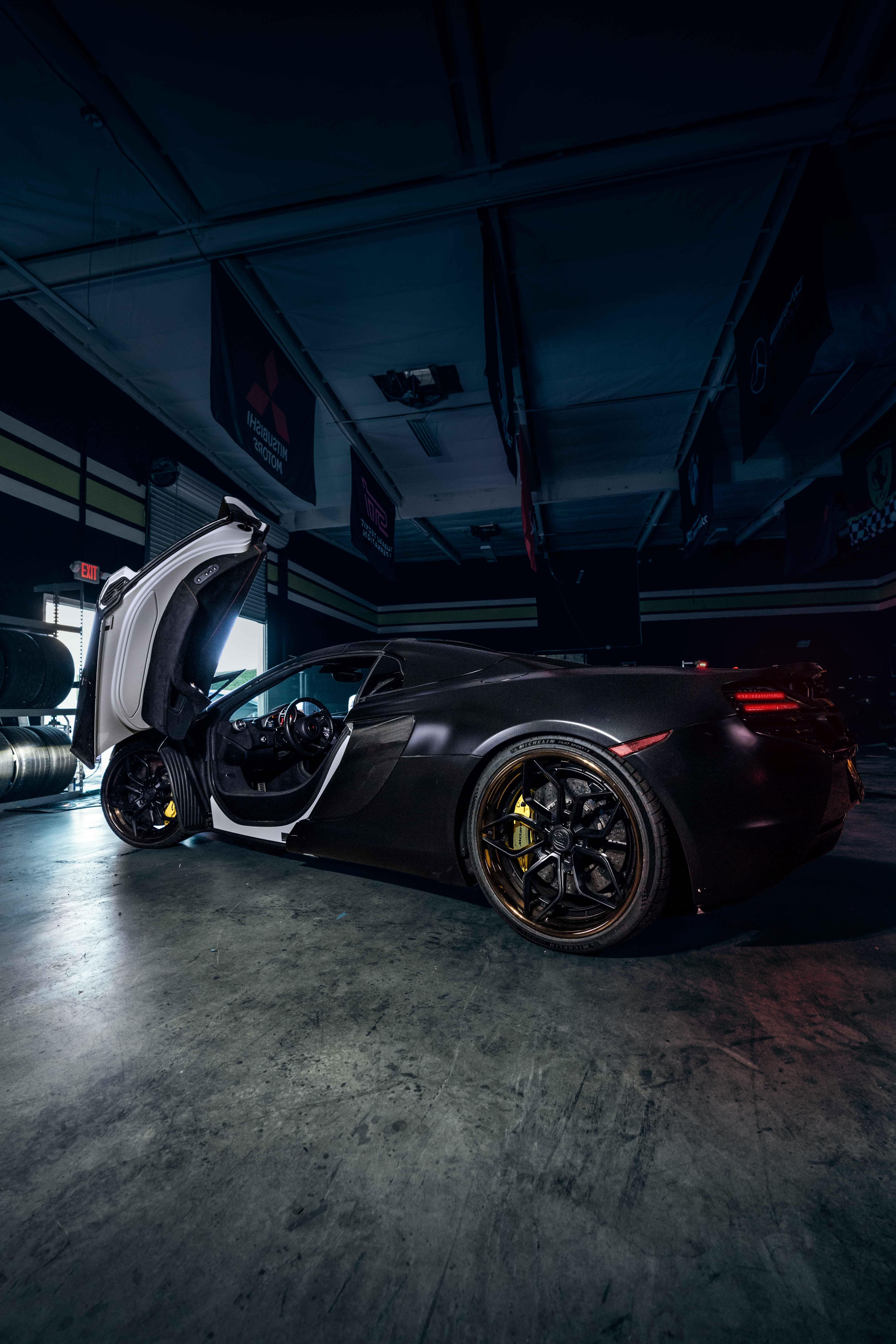 5304x7952 Black Ferrari 458 Italia Parked in Garage · Free