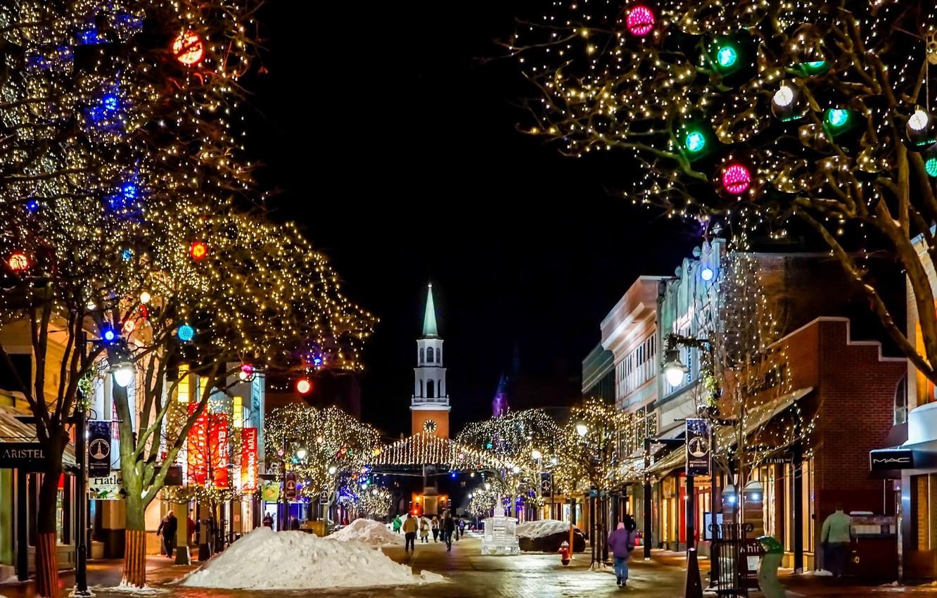 1332x850 Wallpaper snow, decoration, trees, the city, street, building, home, Christmas, the evening, lighting, Christmas, Church, the snow, garland, Burlington image for desktop, section город