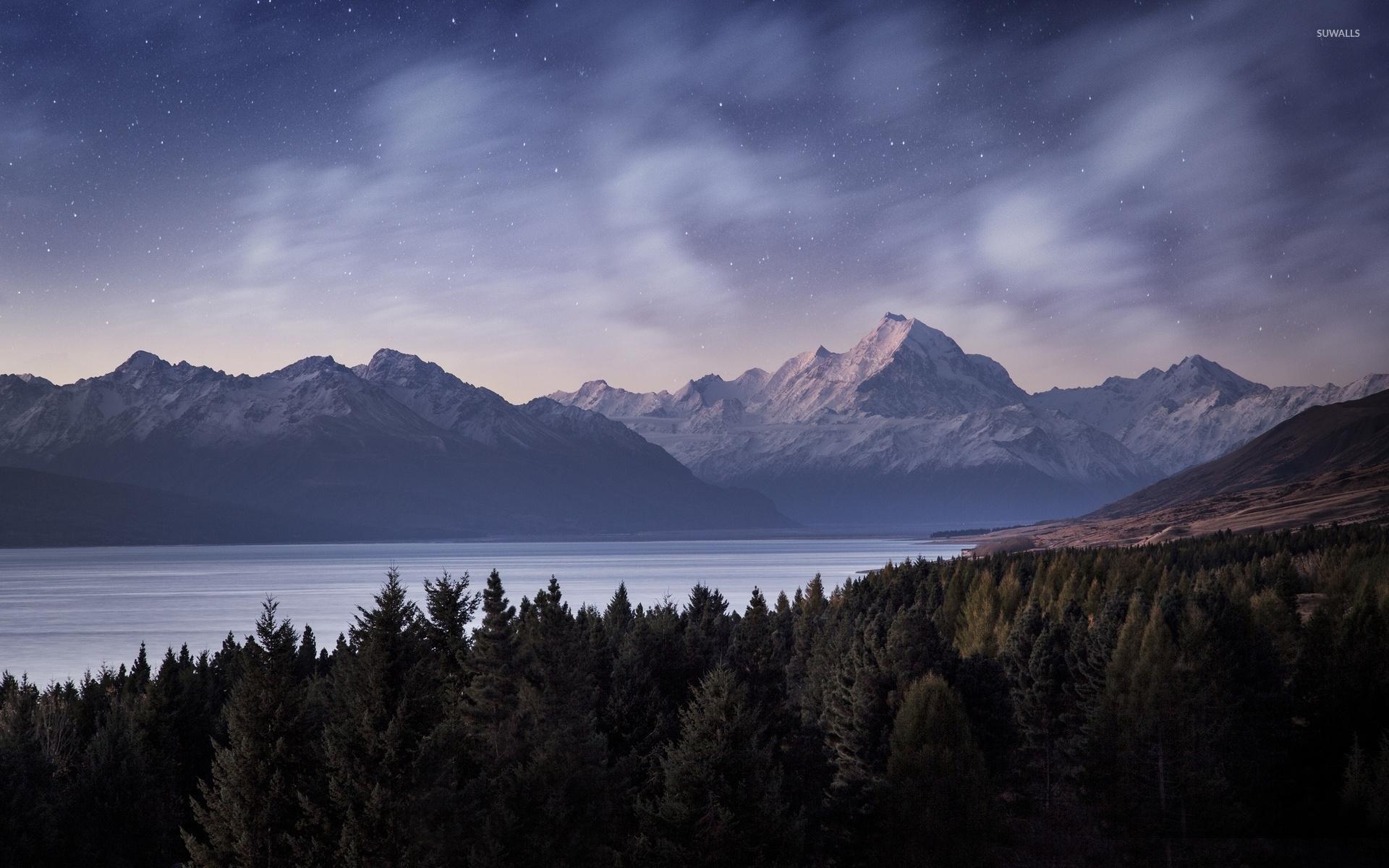 1920x1200 Amazing starred sky at sunset above the rocky mountains wallpaper wallpaper