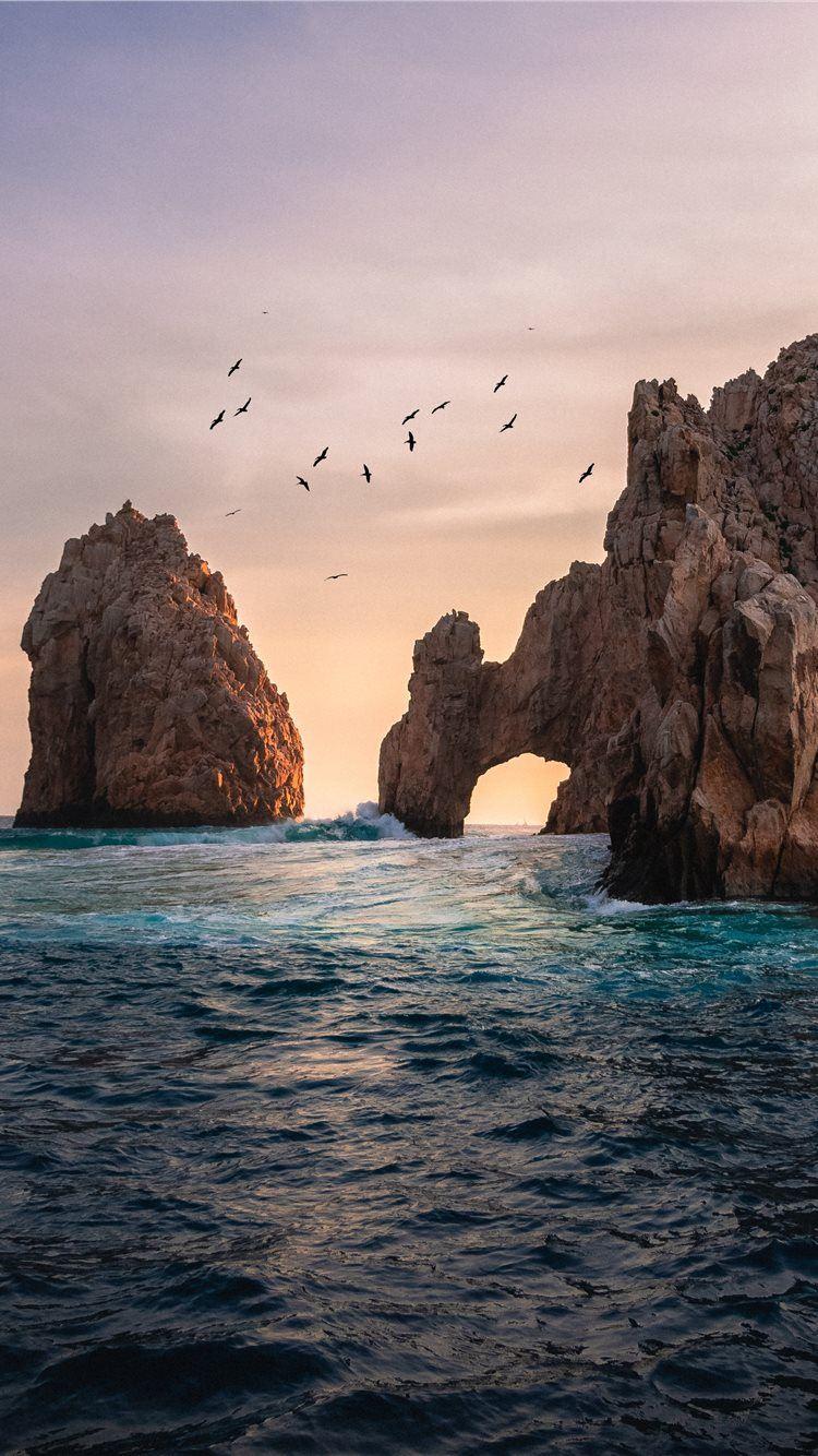 750x1334 rock formation on the ocean photography iPhone 8 Wallpaper Free Download
