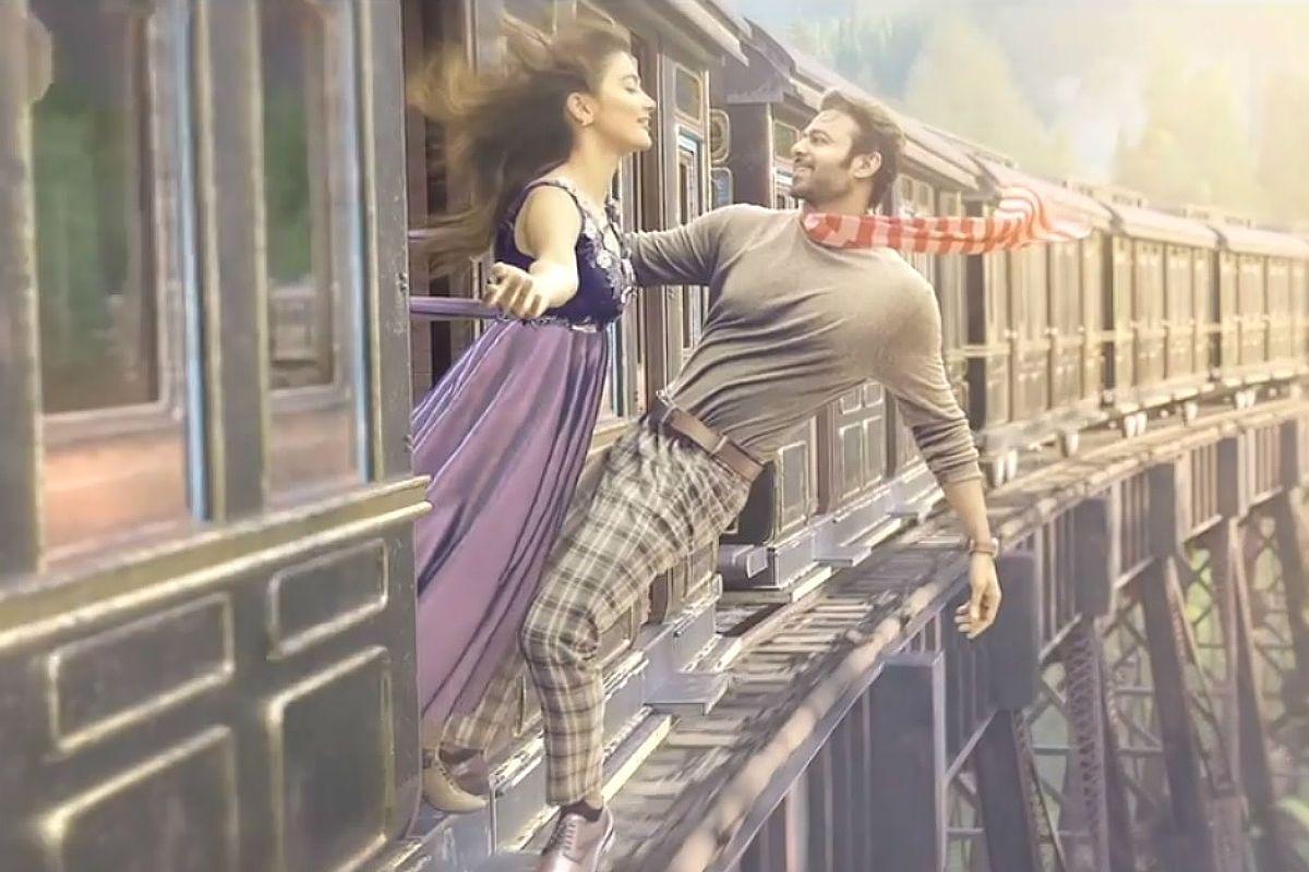 1200x800 At Prabhas Dangles Out of Train With Pooja Hegde in Motion Poster of Radhe Shyam