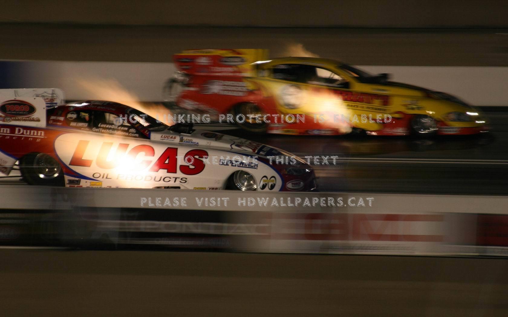 1680x1050 funny cars at night flame fire race track