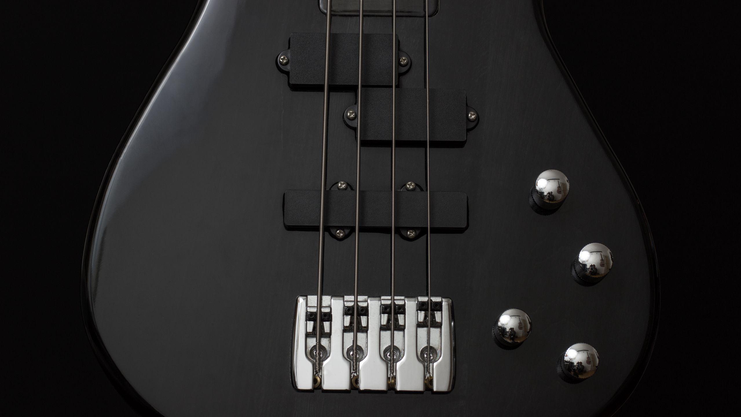 2560x1440 Download wallpaper 2560x1440 guitar, bass guitar, strings widescreen 16:9 HD background