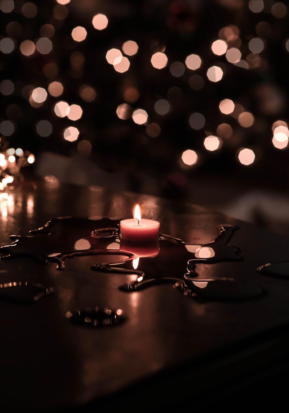 1000x1428 Girl And Candle Wallpaper
