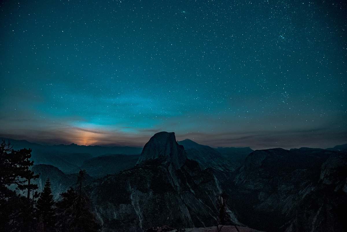 1200x801 Night Snow Covered Mountain During A Twilight Sky Wallpaper Image