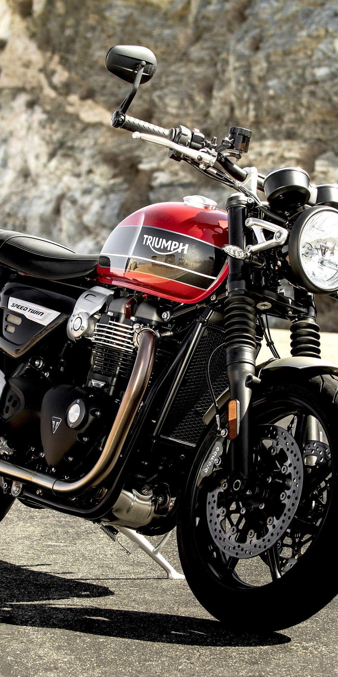 1080x2160 Triumph iPhone Wallpaper