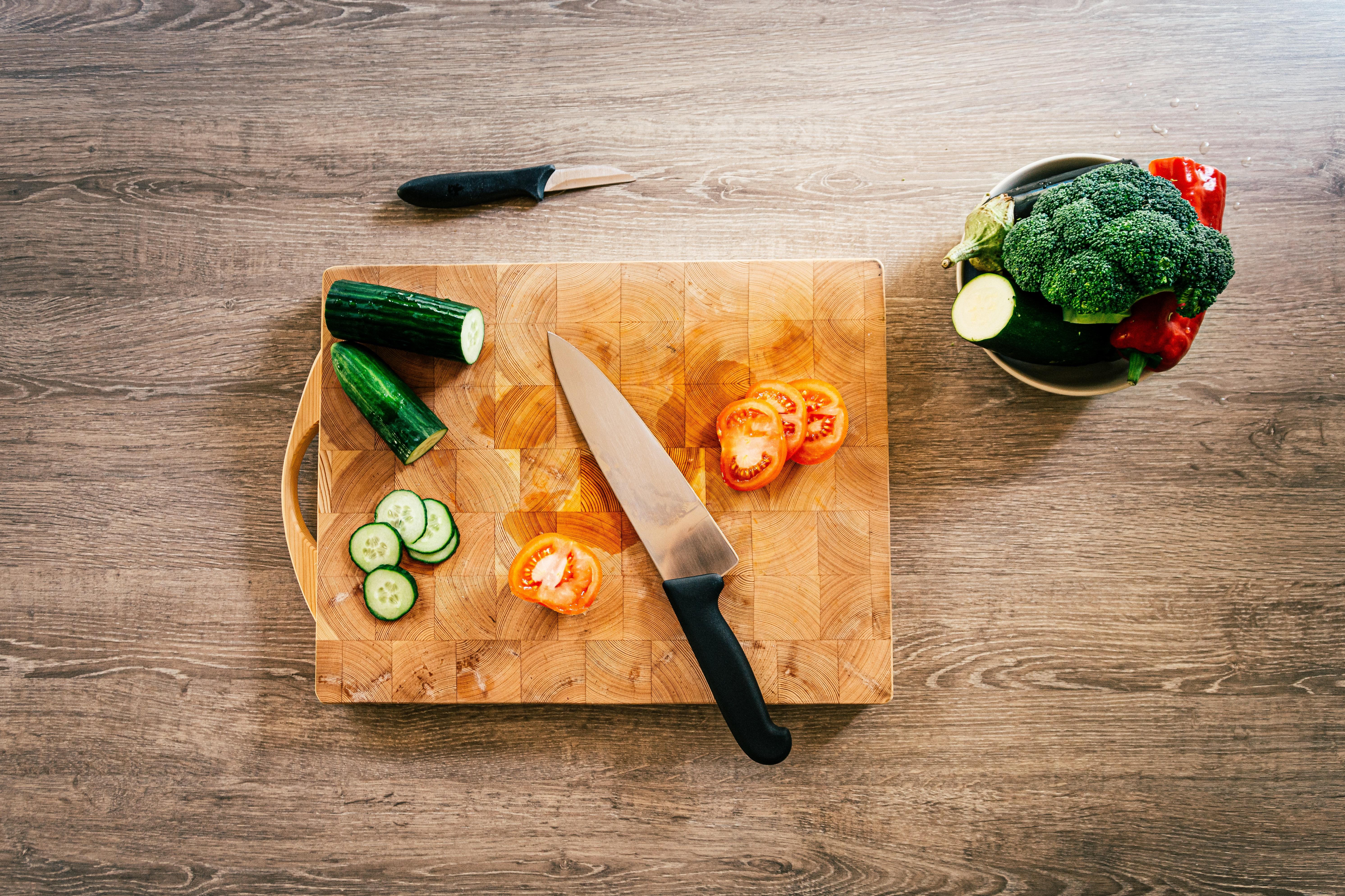 5967x3978 Sliced Vegetables on a Wooden Chopping Board · Free