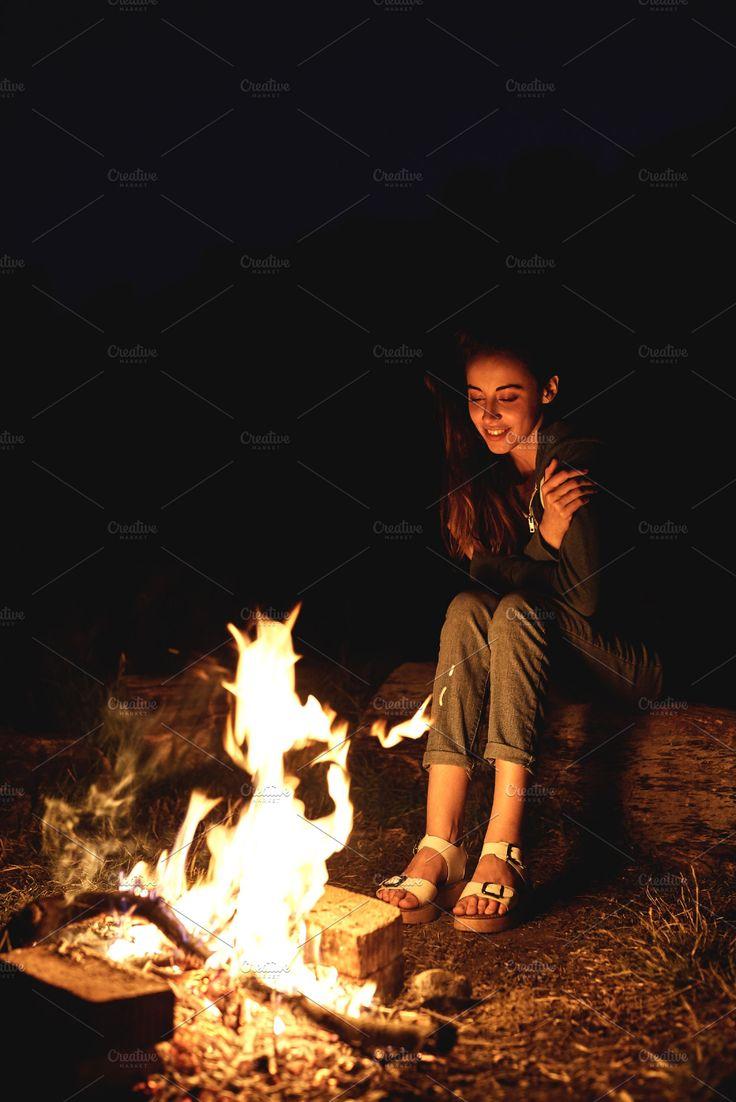 736x1102 Girl at night near the campfire containing campfire, bonfire, and fire. Camp fire girls, Campfires picture, Campfire