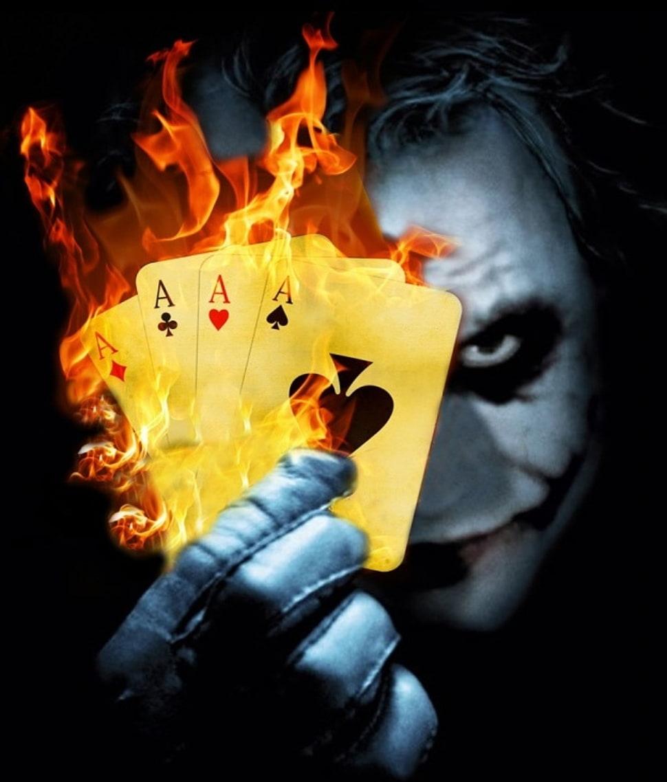970x1138 Joker Holding Four Flaming Ace Playing Cards Illustration Wallpaper Joker