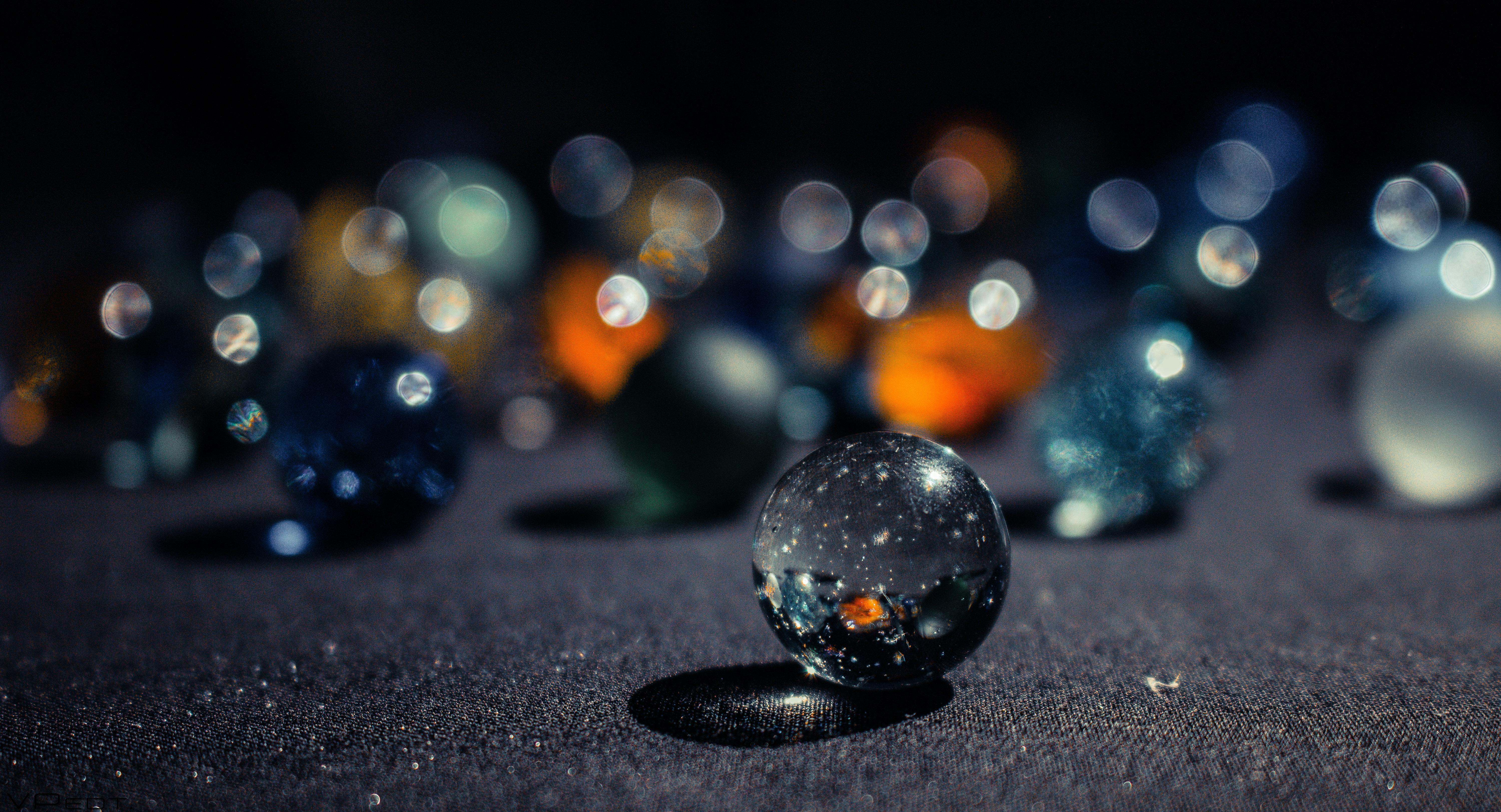 6000x3248 Selective Focus Photography of Marble Ball · Free