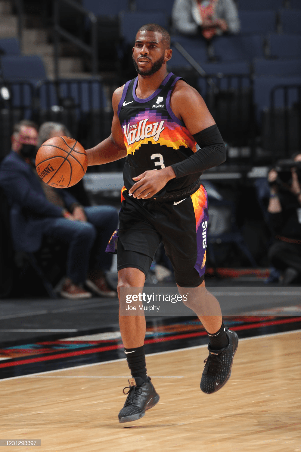 1000x1500 Chris Paul of the Phoenix Suns handles the ball during the game. Chris paul, Phoenix suns, Phoenix suns basketball