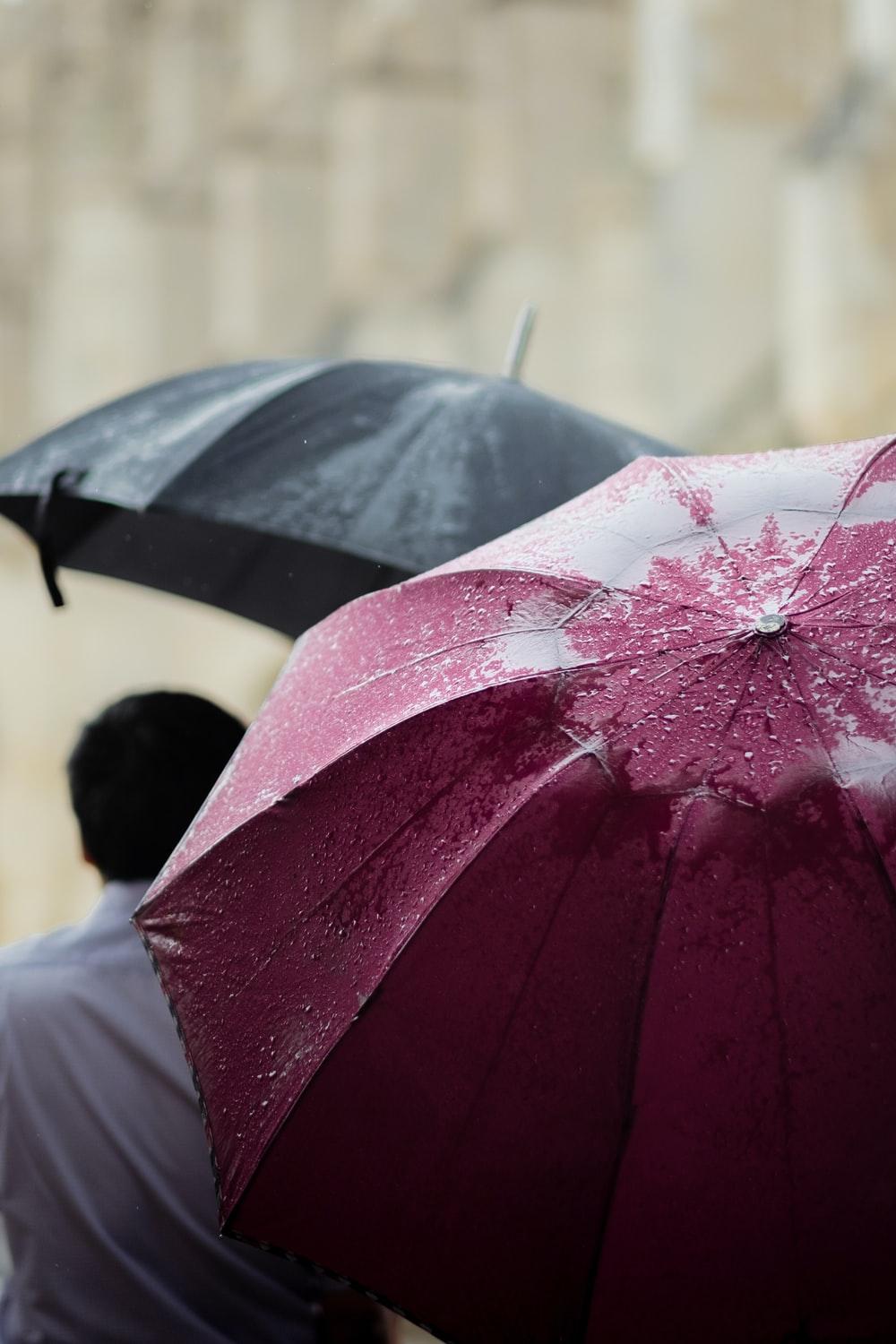1000x1500 man holding umbrella photo