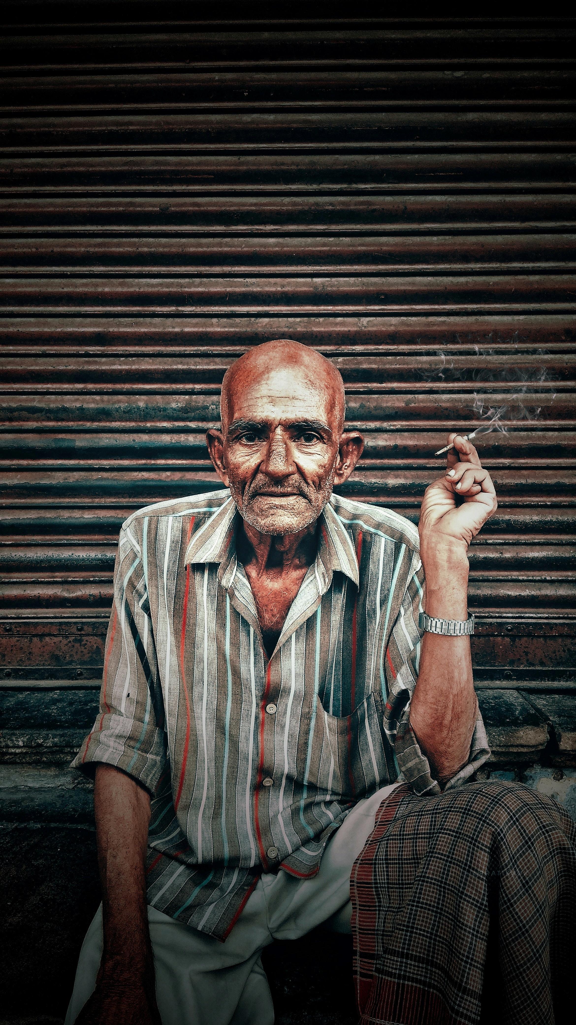 2340x4160 Photo Of An Old Man Smoking Cigar · Free