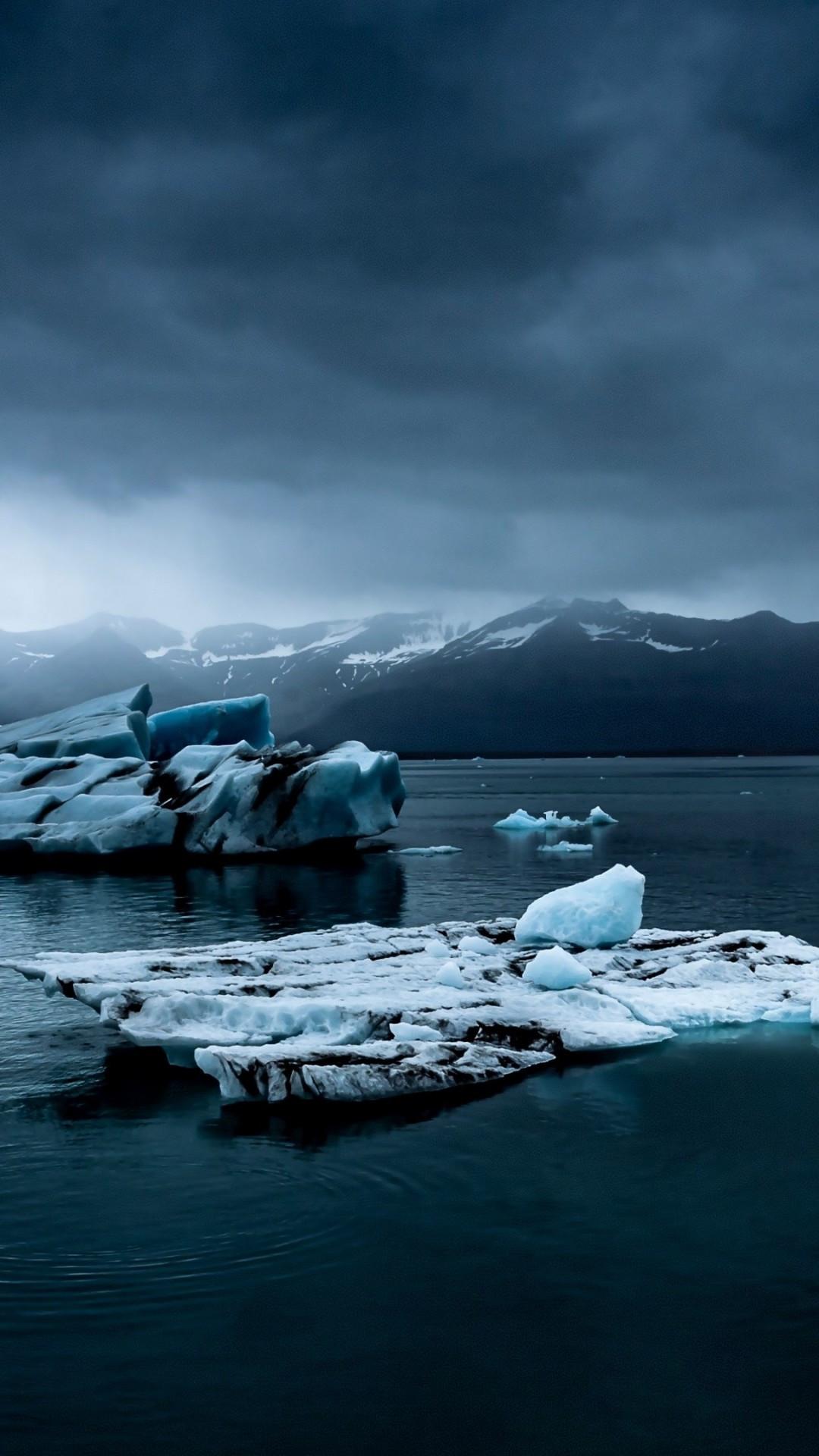 1080x1920 Download 1080x1920 Iceland, Iceberg, Dark Clouds Wallpaper for iPhone iPhone 7 Plus, iPhone 6+, Sony Xperia Z, HTC One