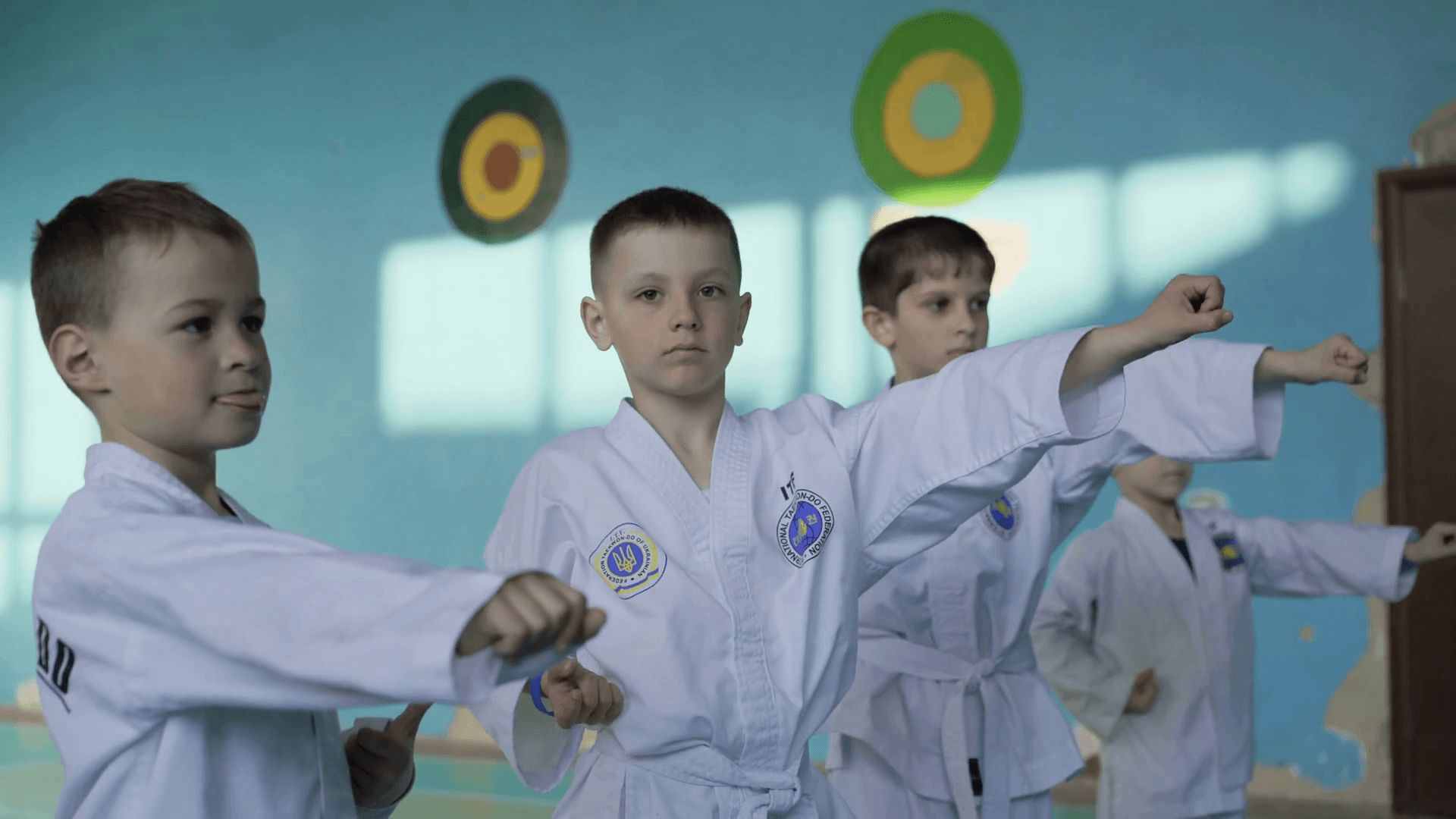 1920x1080 Funny male kids training a taekwondo in the gym in 4K Stock Video
