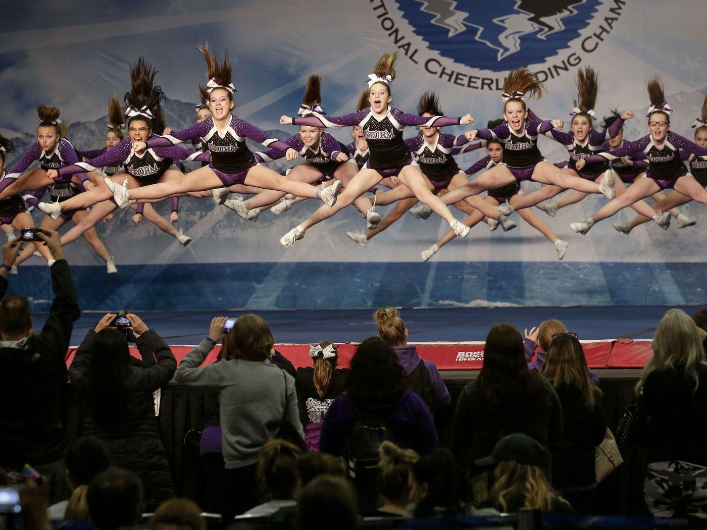 1400x1050 The Evolution of the Cheerleading Uniform, From Bulky Sweaters to Crop Tops