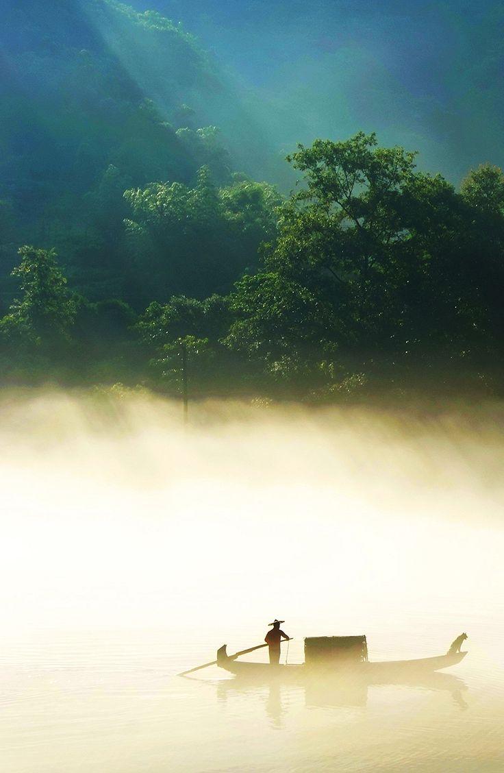 736x1128 The fisherman on the misty lake in the countryside of Hunan Province, China. © bingham008. Forest wallpaper, Desktop wallpaper, Landscape