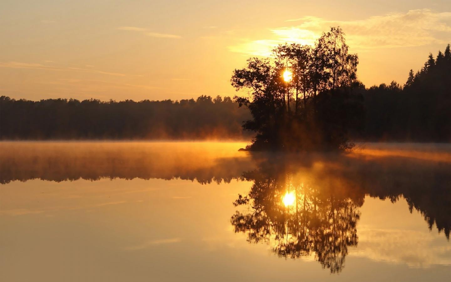 1440x900 Sunset Over a Misty Lake Wallpaper