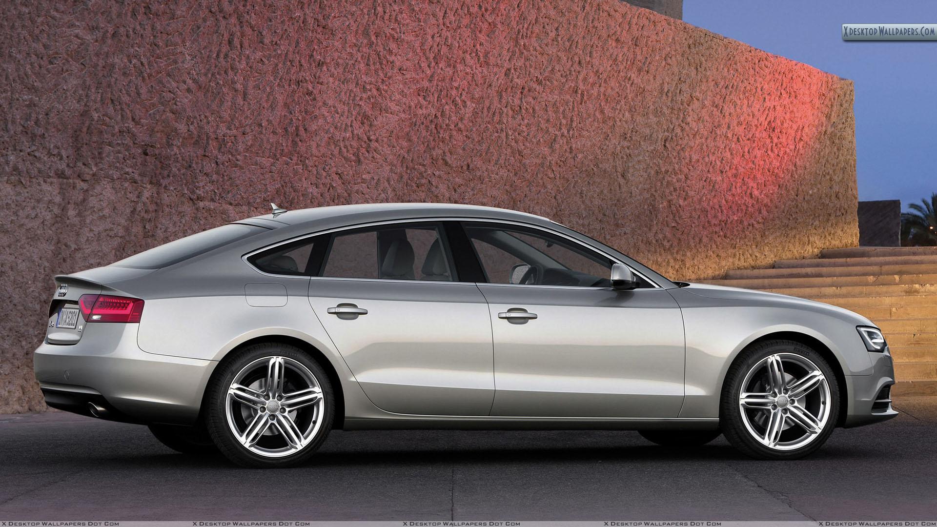 1920x1080 Side Pose of 2012 Audi A5 Sportback Outside Building Wallpaper