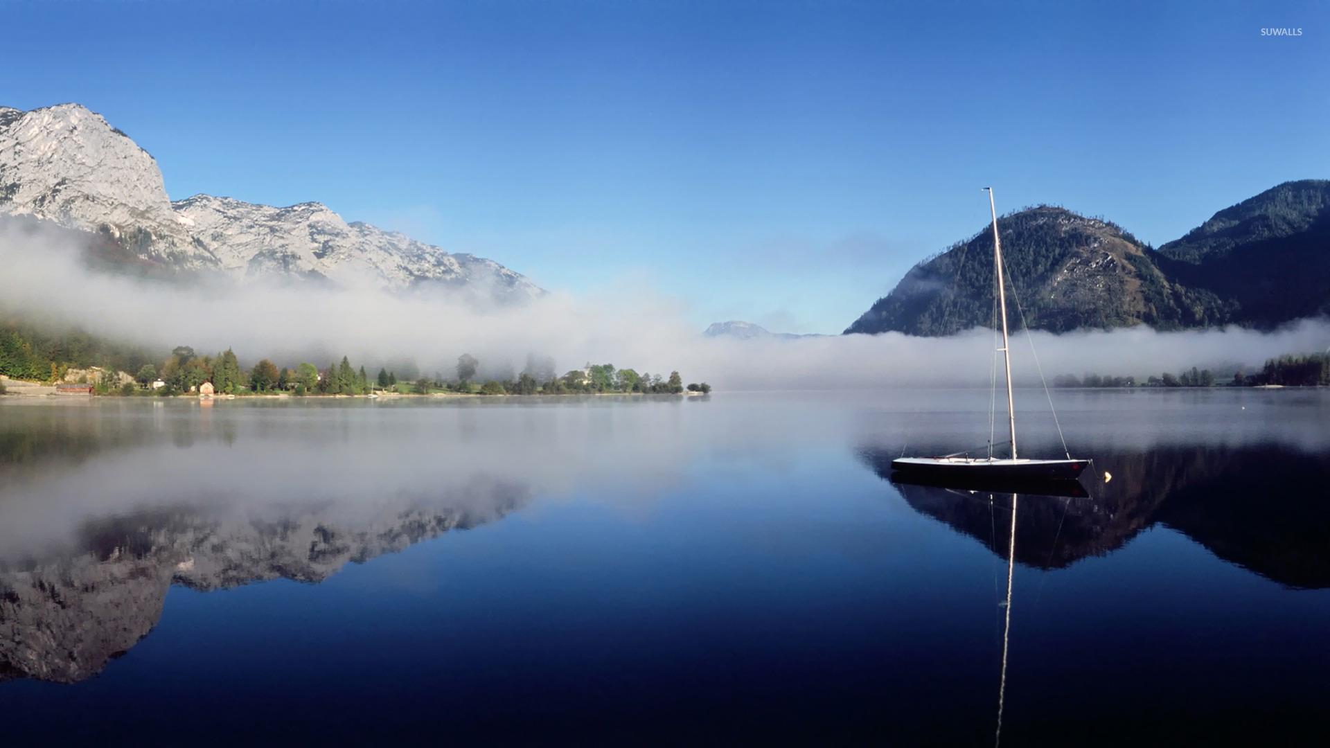 1920x1080 Boat on the mountain lake wallpaper wallpaper