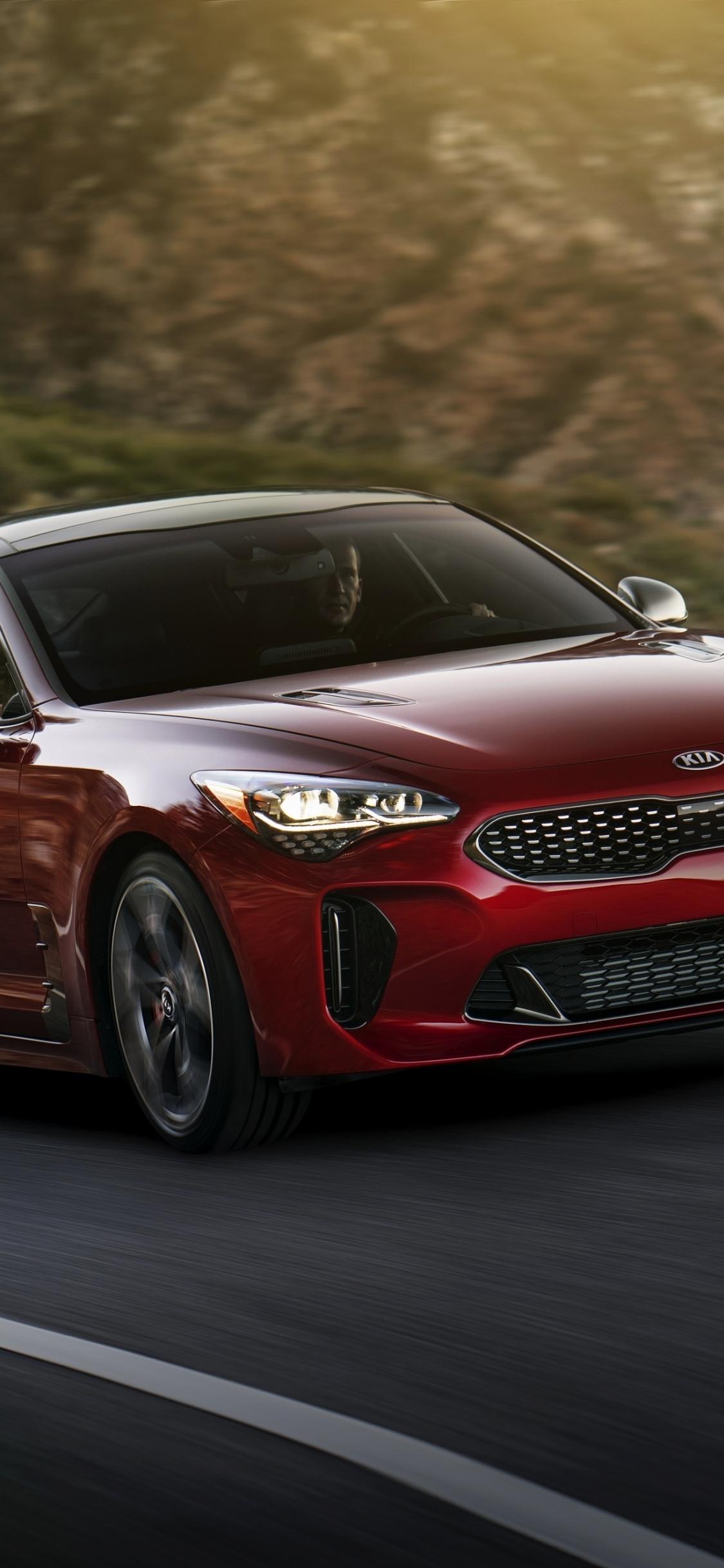 1125x2436 Download 1125x2436 wallpaper red sedan, kia stinger, iphone x 1125x2436 HD image, background, 19546