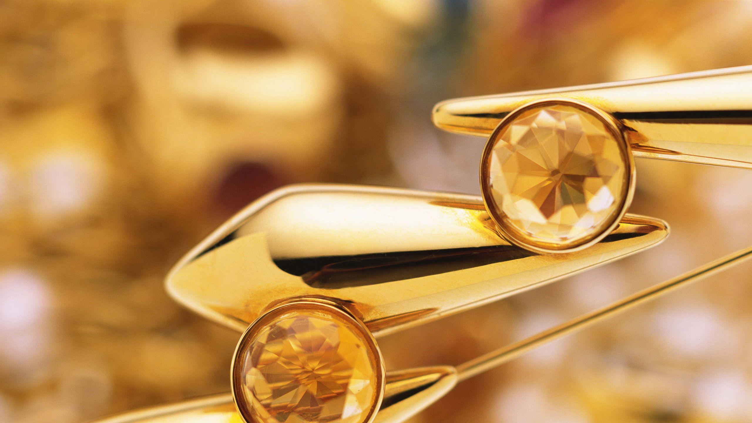 2560x1440 Download wallpaper 2560x1440 jewelry, gold, bright widescreen 16:9 HD background