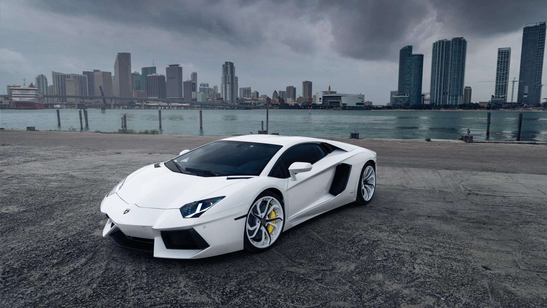 1920x1080 Download 1920x1080 Lamborghini Aventador, White, Skyscrapers, Cityscape, Supercar, Cars Wallpaper for Widescreen