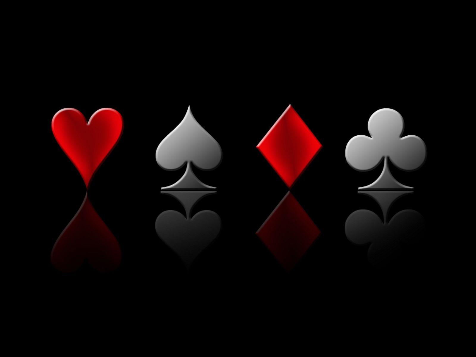 1600x1200 Four symbols of the Poker game and black colors