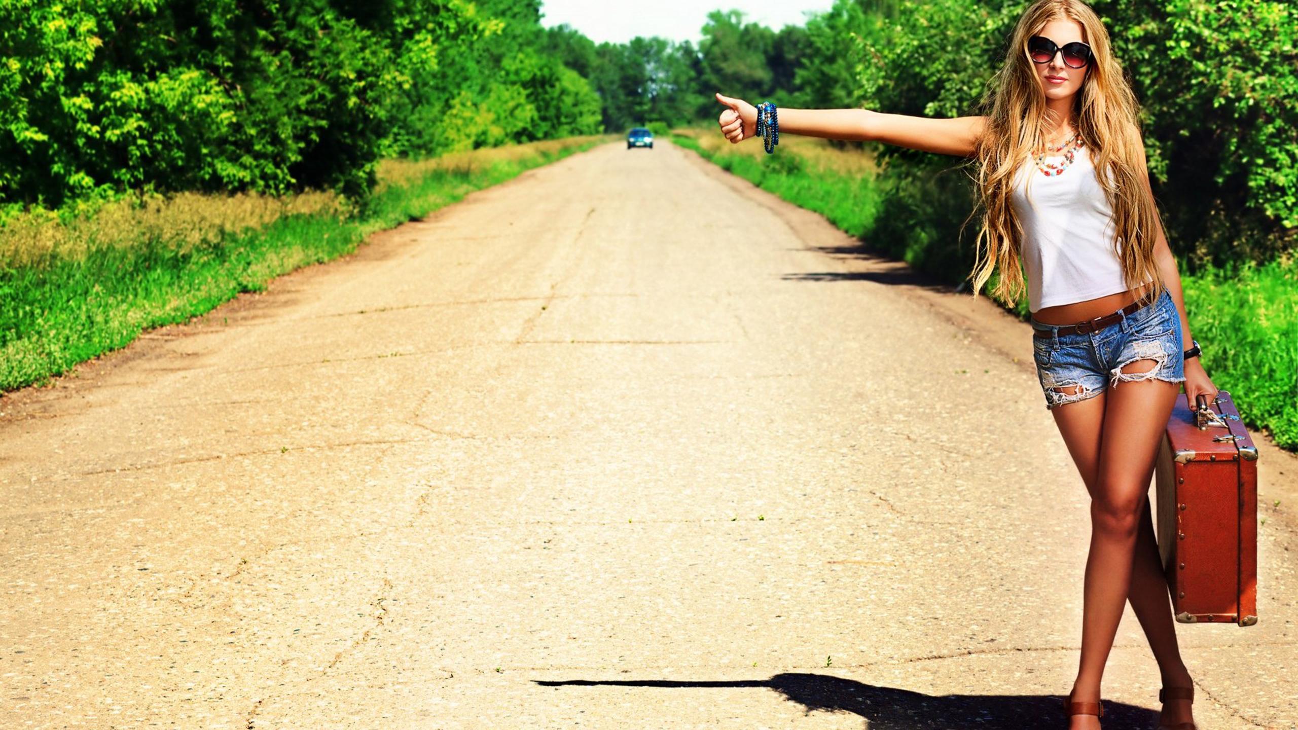 2560x1440 Blonde Girl Hitch Hiking HD Wallpaper