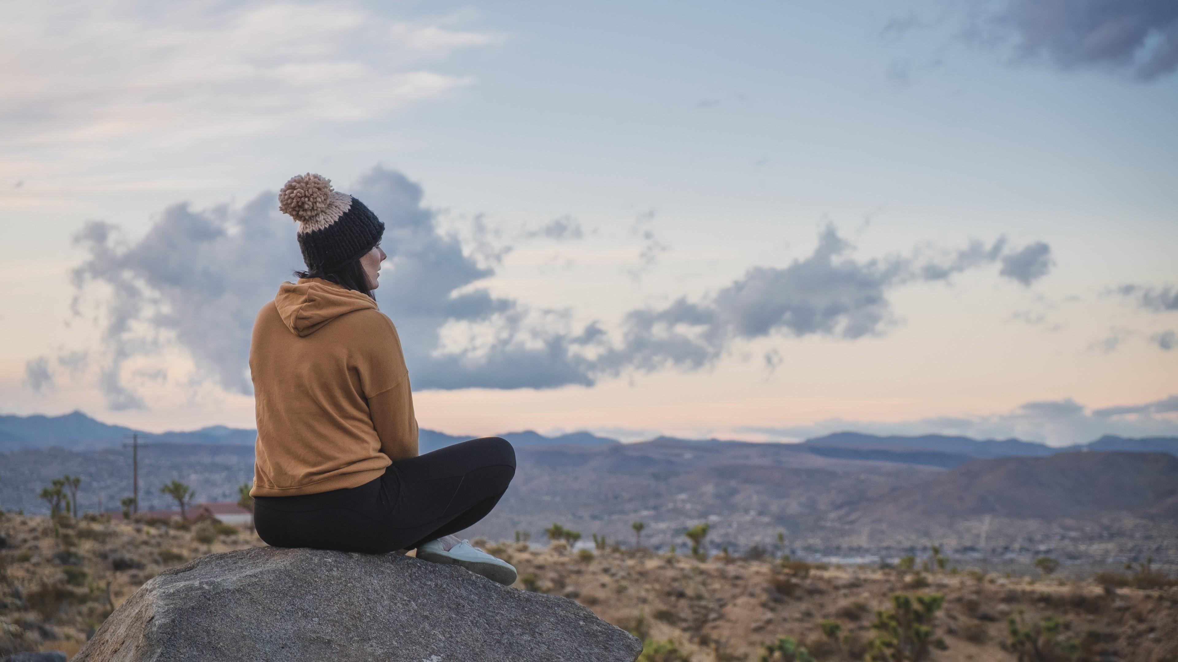 3840x2160 Download 3840x2160 Woman, Rock, Hiking, Beanie, Clouds, Scenery Wallpaper for UHD TV