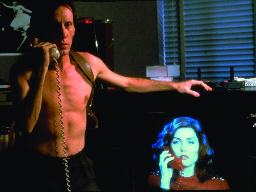 1024x768 Videodrome (The Criterion Collection) : James Woods, Debbie Harry, Sonja Smits, Peter Dvorsky, Leslie Carlson, Jack Creley, Lynne Gorman, Julie Khaner, Reiner Schwarz, David Bolt, Lally Cadeau, Henry Gomez, Mark Irwin