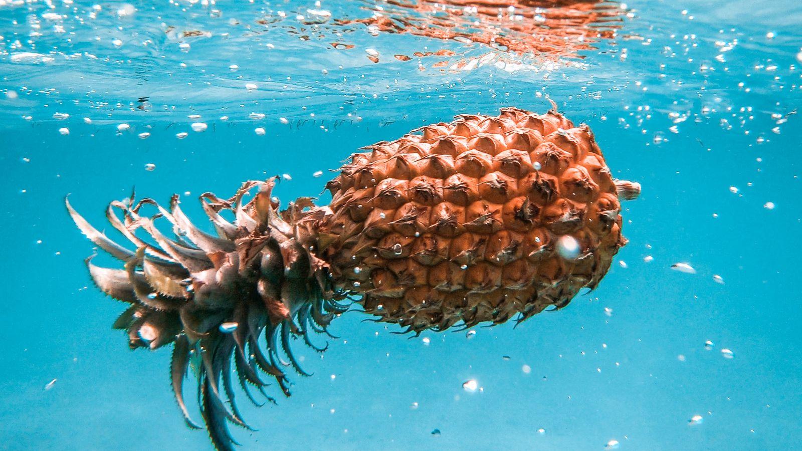 1600x900 Download wallpaper 1600x900 pineapple, fruit, tropical, water, bubbles widescreen 16:9 HD background