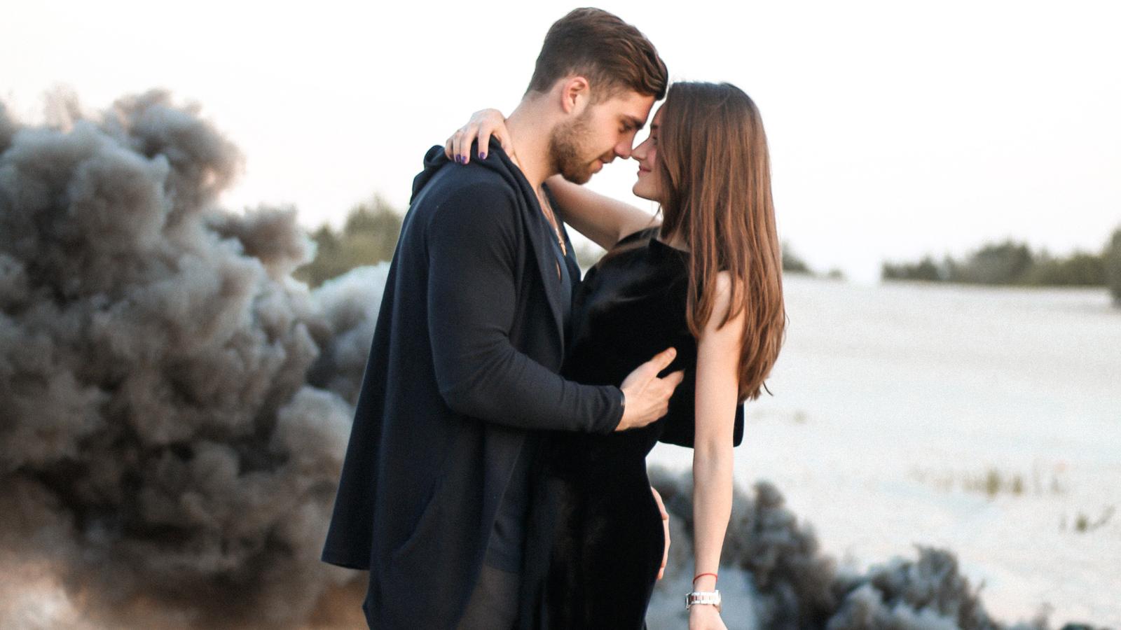 1600x900 Cute Couple Black Clothing Beach Side 1600x900 Resolution HD 4k Wallpaper, Image, Background, Photo and Picture
