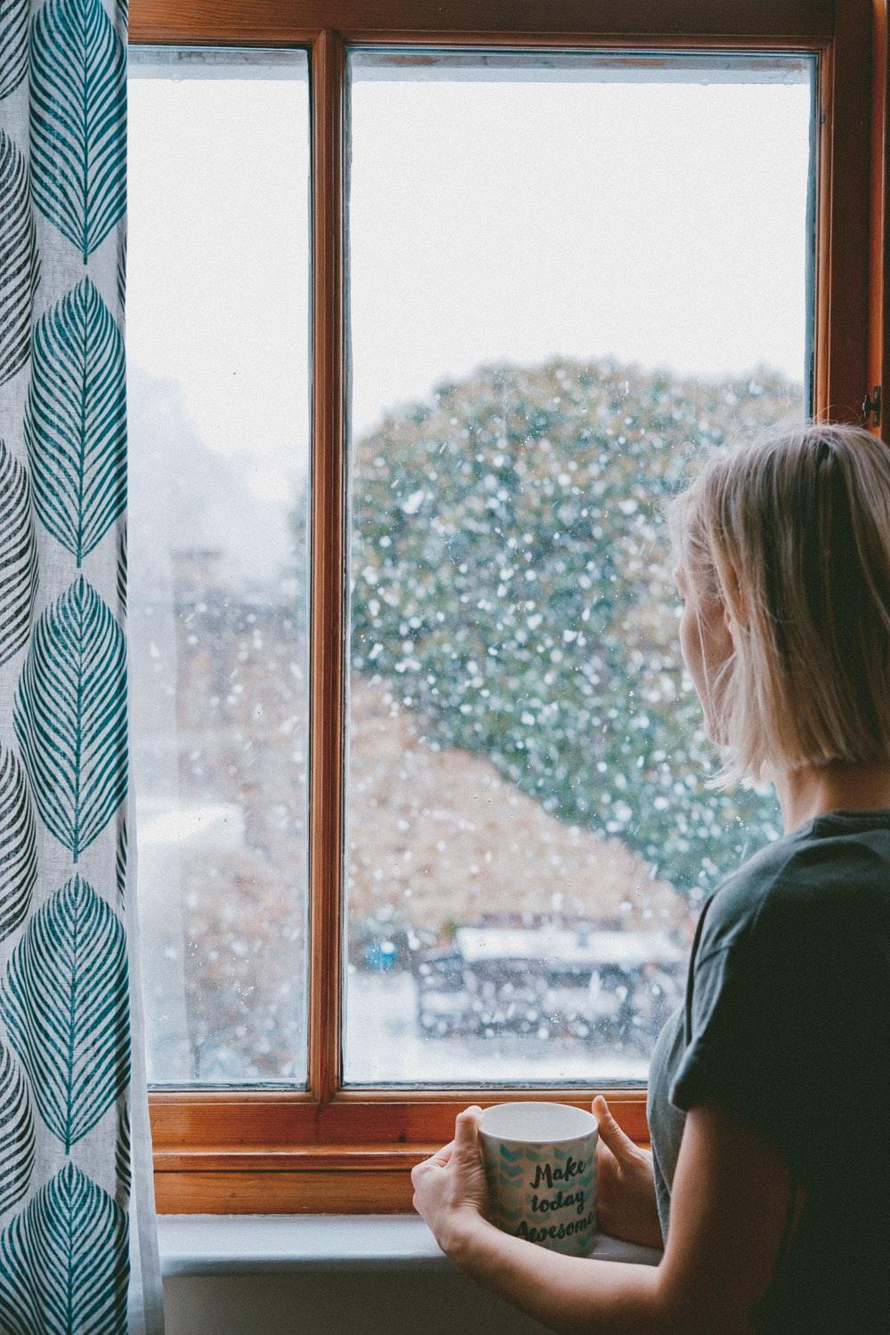 1000x1500 Woman Looking Out Window Picture. Download Free Image