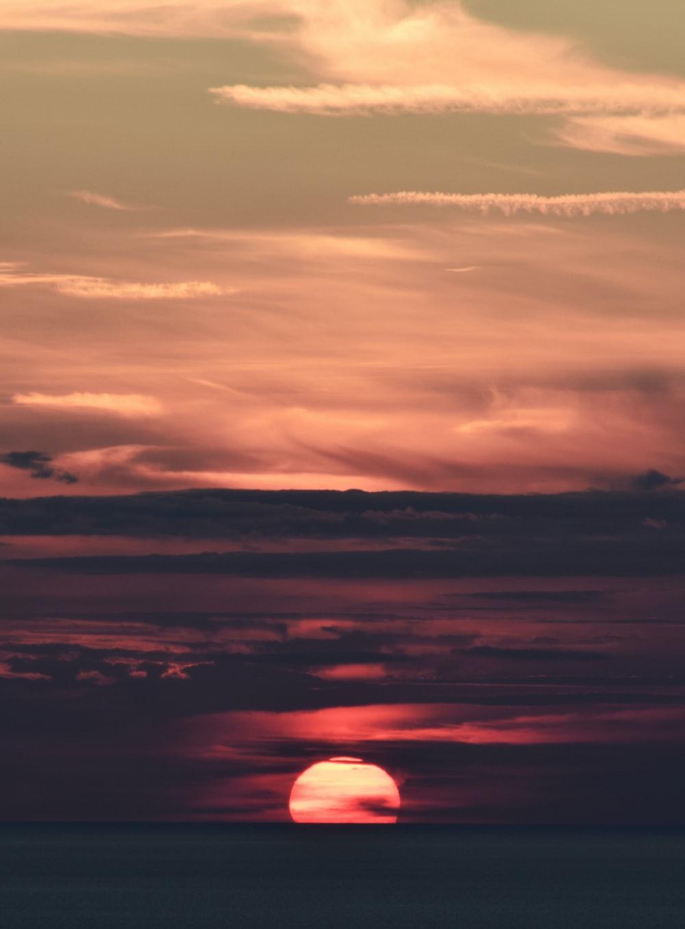 1000x1356 sunset sky with clouds photo