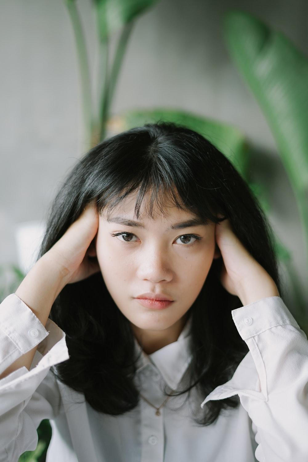 1000x1500 woman in white collared shirt photo