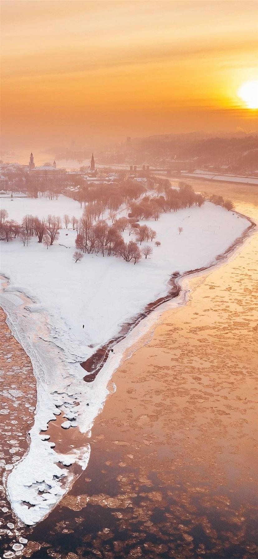 828x1792 kaunas river city winter snow sunlight iPhone 11 Wallpaper Free Download