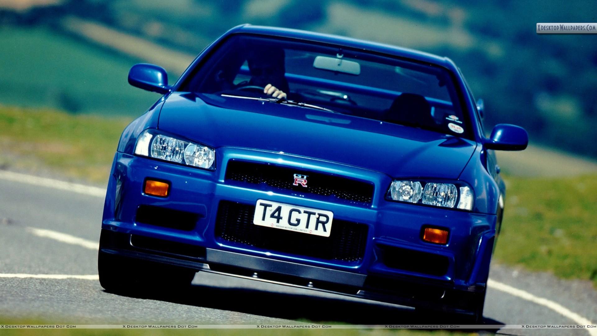 1920x1080 Nissan Skyline GT R R34 Blue Color On Highway Wallpaper