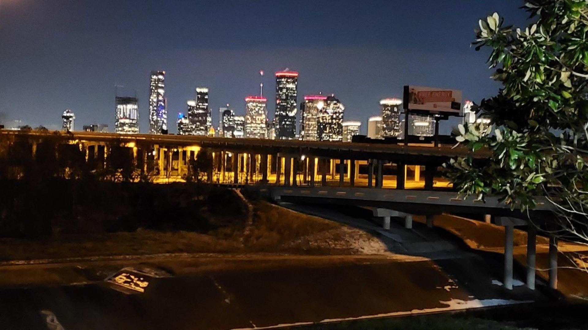 1920x1080 Frustration expressed over image of downtown Houston lit up during major winter power outage