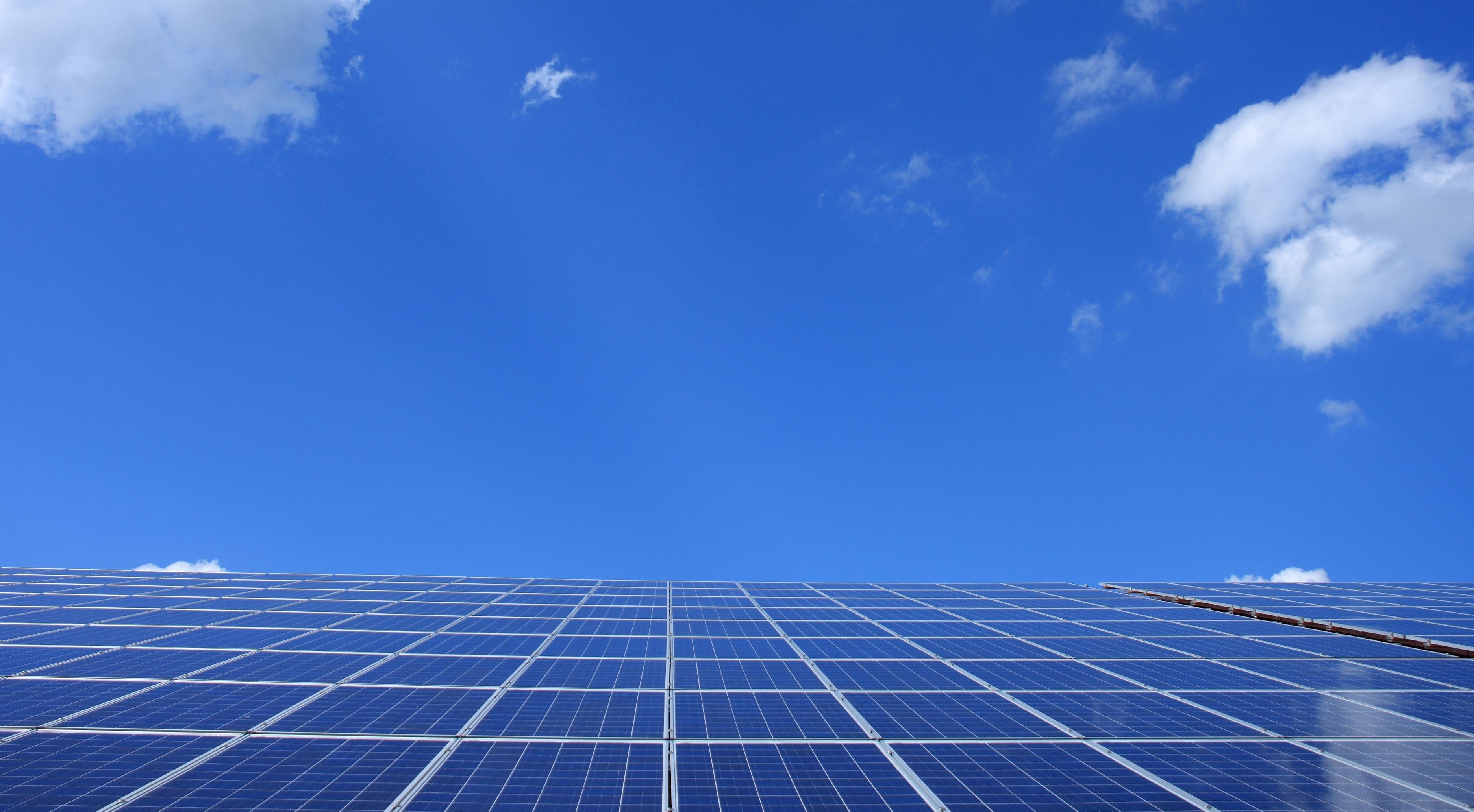 3744x2064 Blue Solar Panels Under Sunny Sky · Free