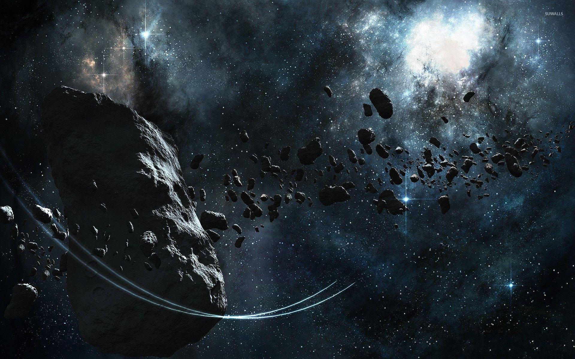 1920x1200 Large asteroid surrounded by smaller ones wallpaper wallpaper